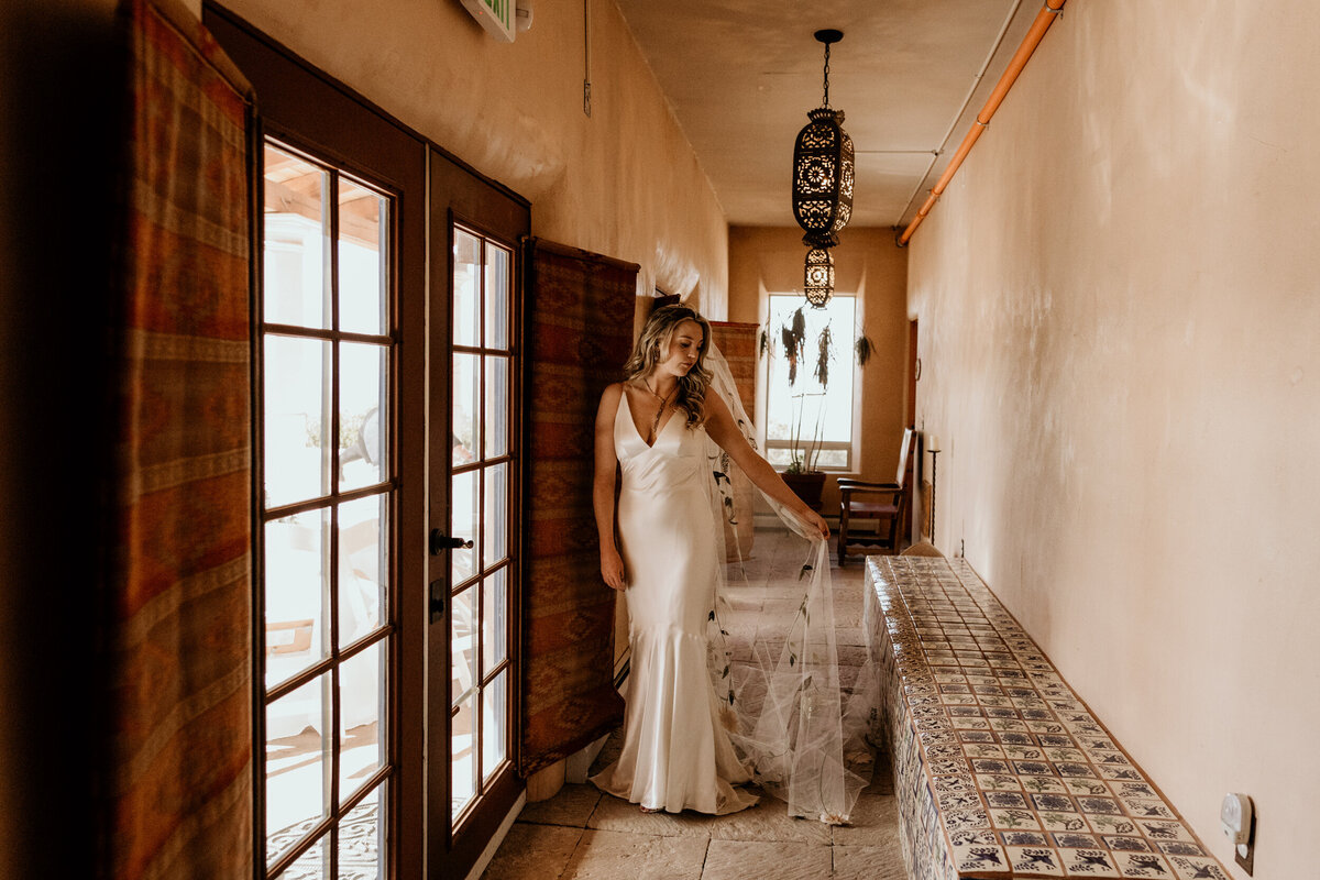 bride standing in a southwestern hall in Santa Fe, New Mexico