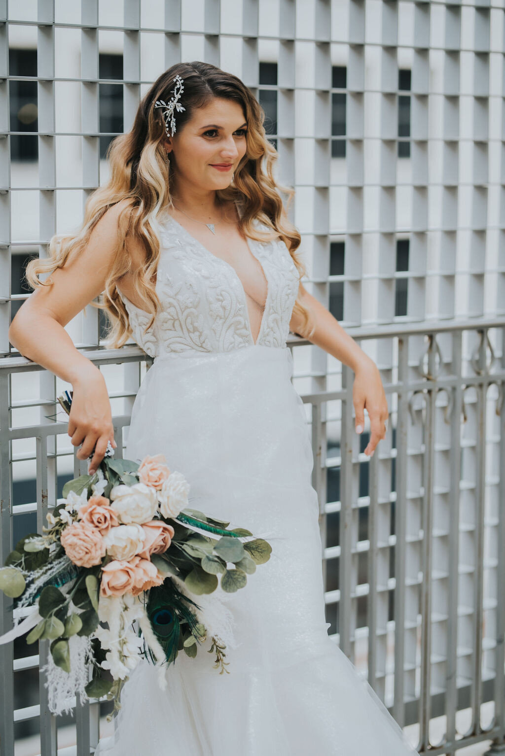 The Faven v-neck mermaid wedding dress style is sparkly and timeless bridal look by indie bridal designer Edith Elan.