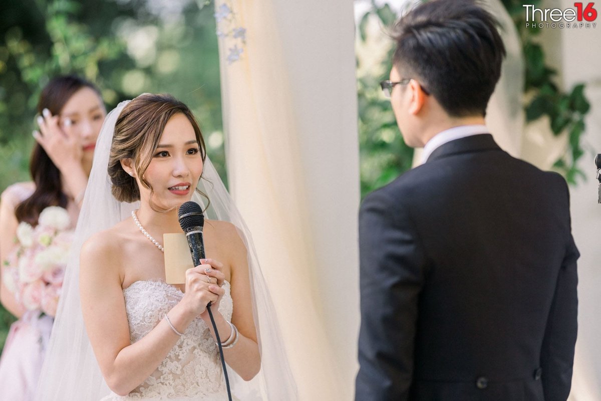 Bride recites her vows to her Groom