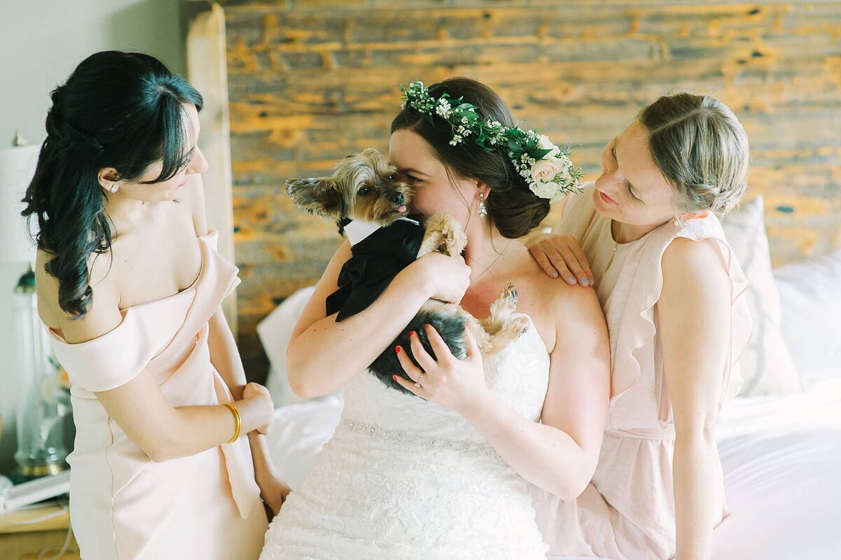 bride getting ready with her girls and dog at a Lake Tahoe wedding