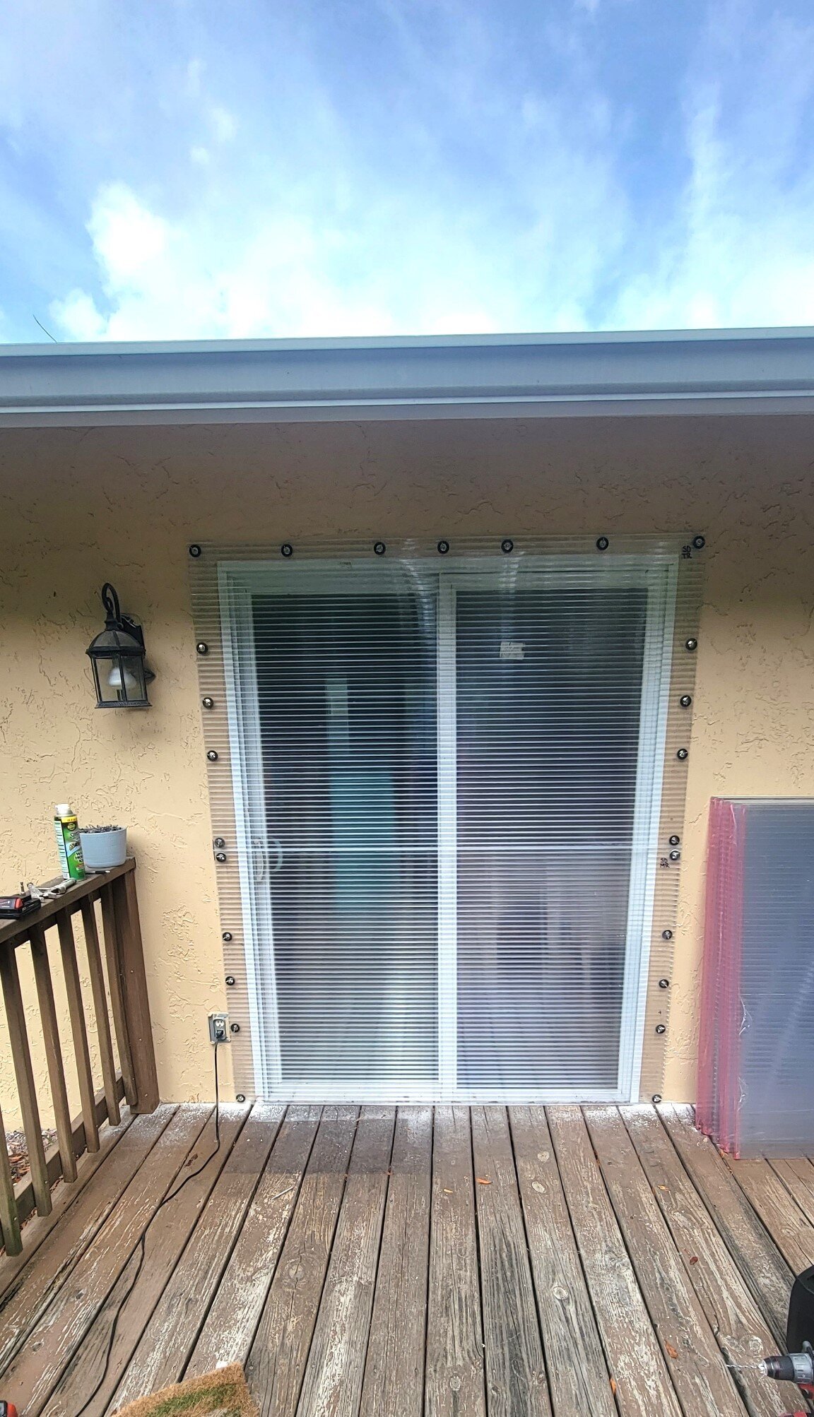 hurricane-shutter-storm-panel-over-sliding-glass-door