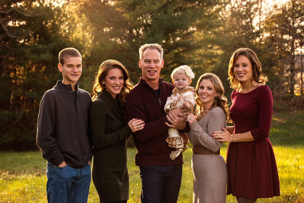 Family portrait photography is beautiful when done outdoors in the fall