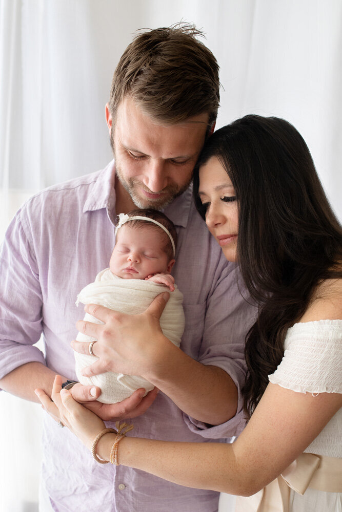 Newborn session of baby girl with parents