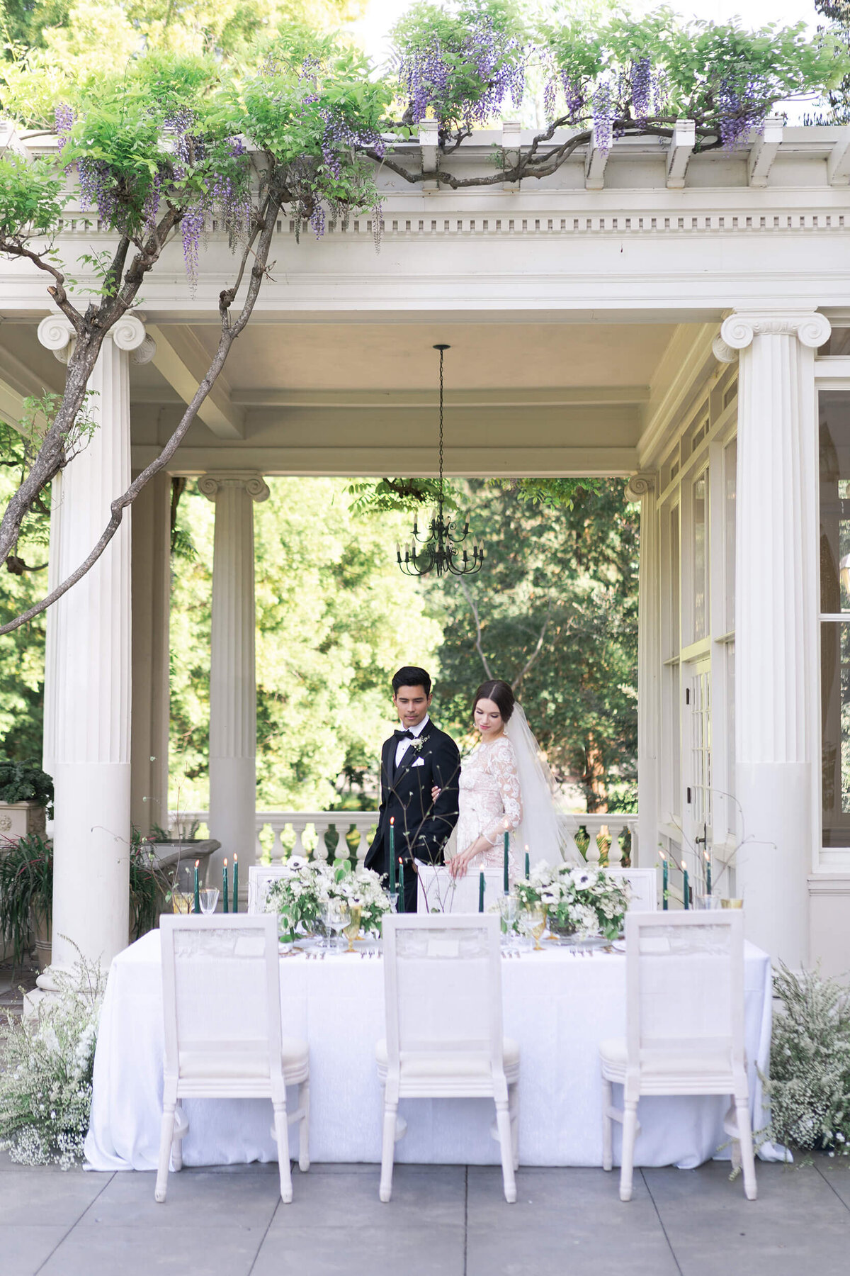 bride and groom look at their reception space on their wedding day at Villa Montalvo in Saratoga California
