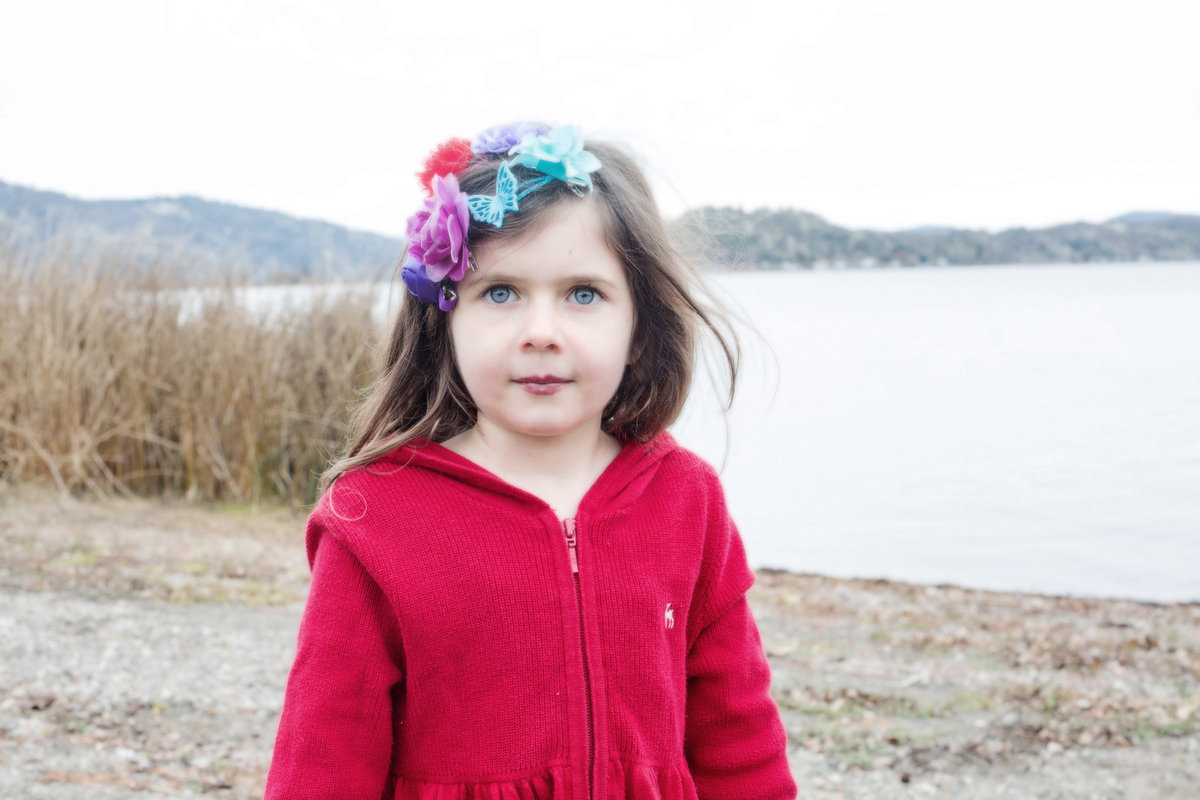 beautiful little girl on lake