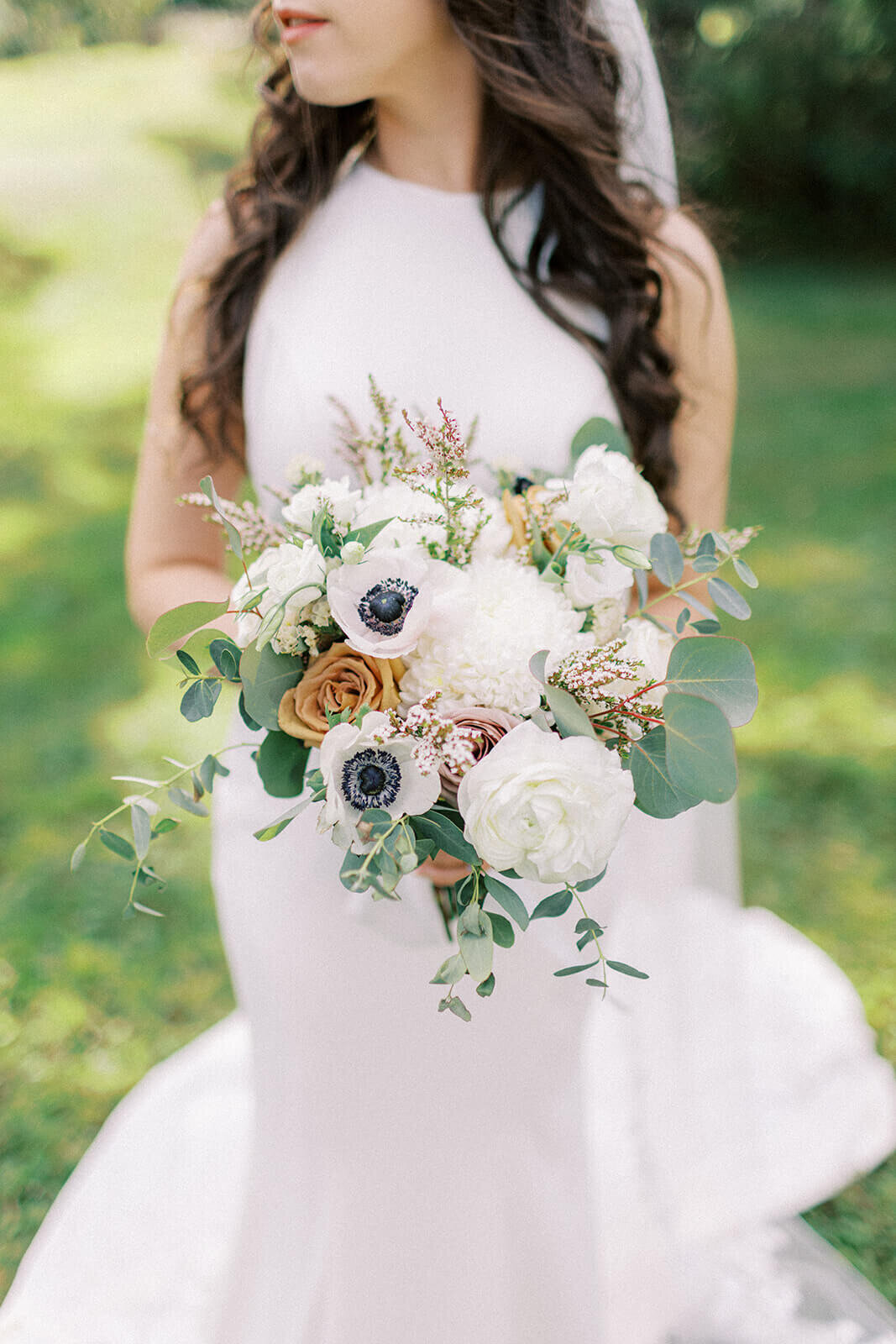 bride-holds-flower-bouquet