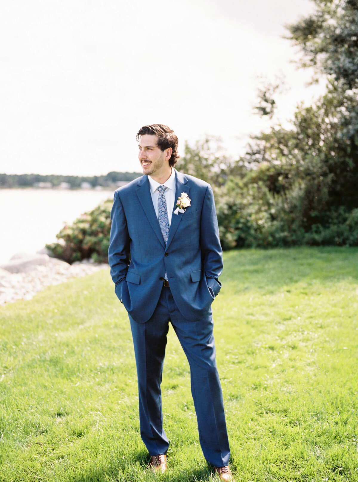 Groom solo portraits at Oak Island Resort wedding, Nova Scotia