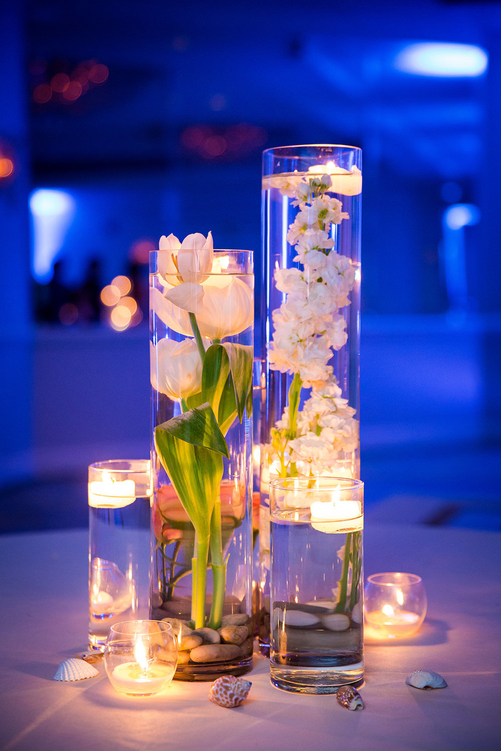 wedding photos candles with flowers floating in water