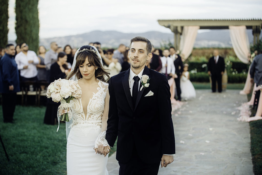 Wedding Photograph Of Bride And Groom Walking Los Angeles
