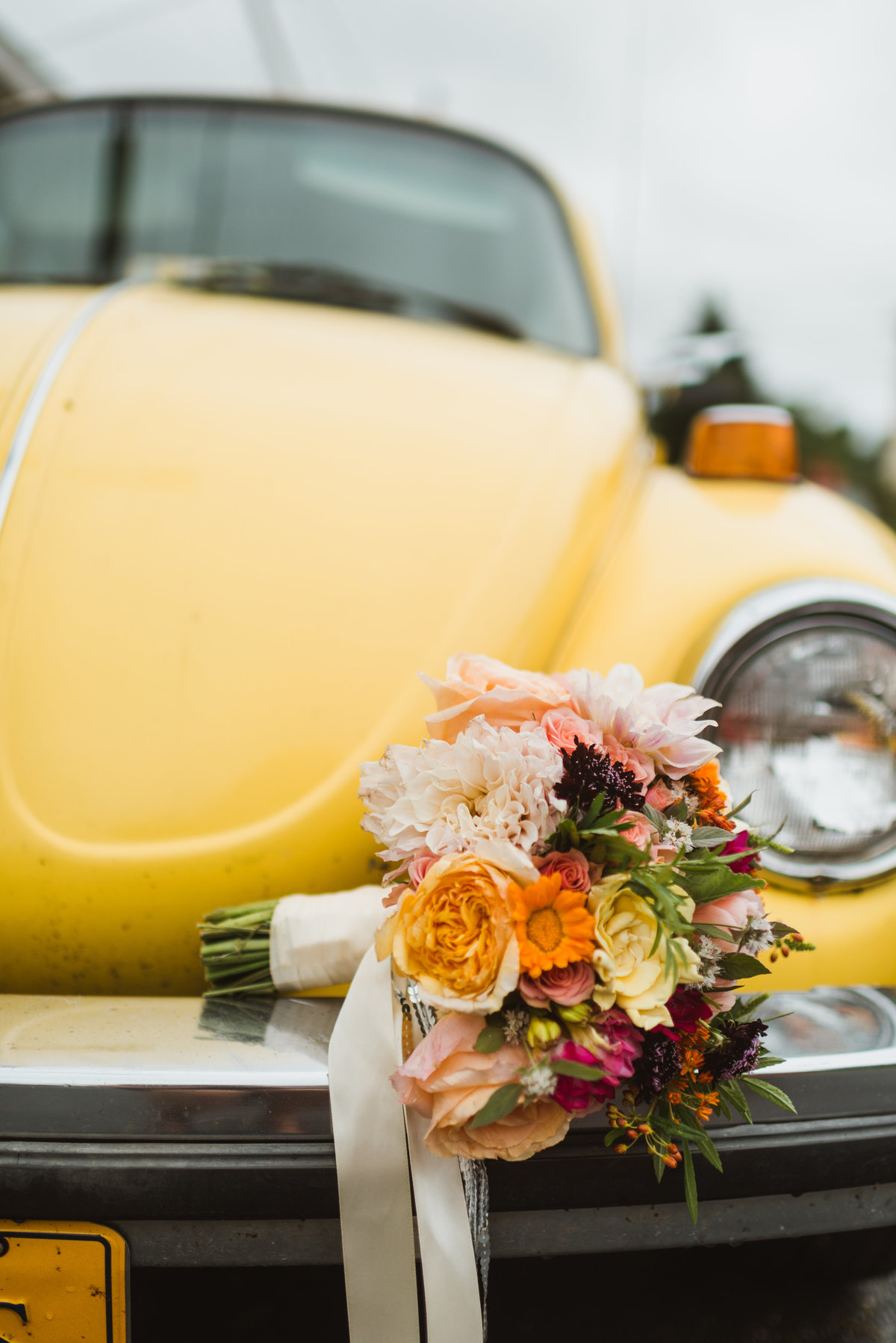 Yellow VW Bug wedding photo