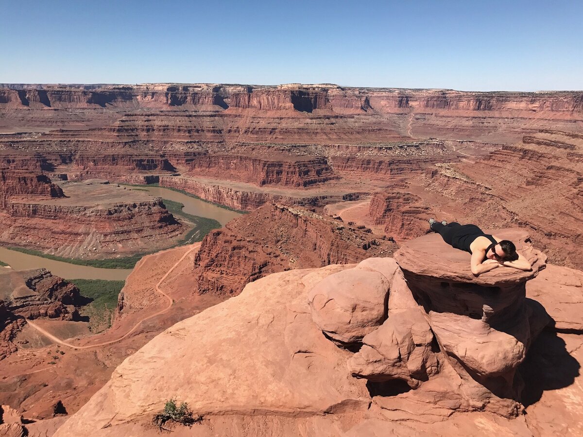 Woman laying on a rock