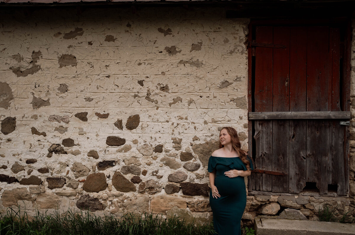 pregnant woman posing for her maternity session in Madison, WI. 