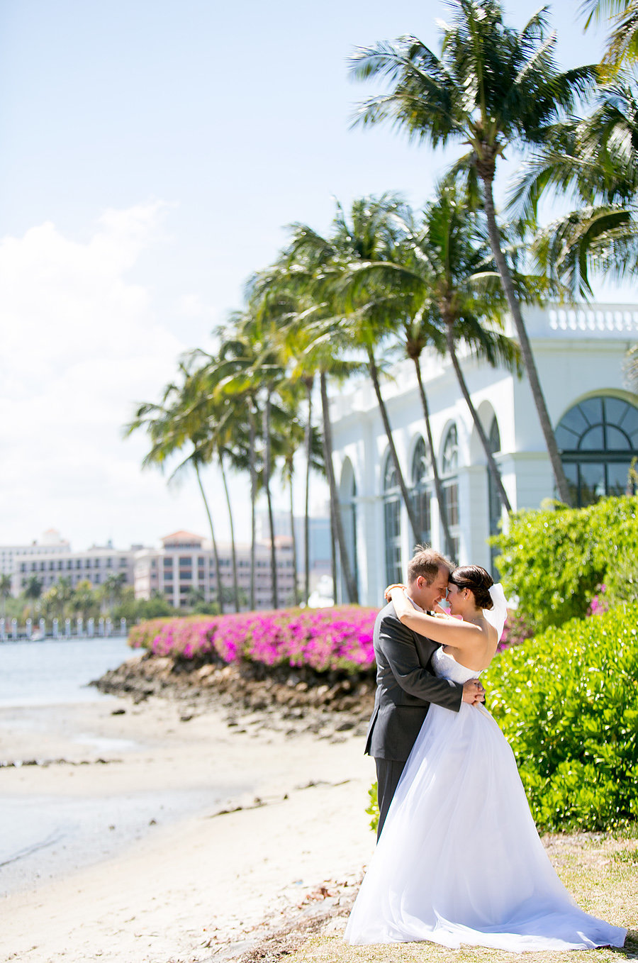 flagler museum wedding couple out by water
