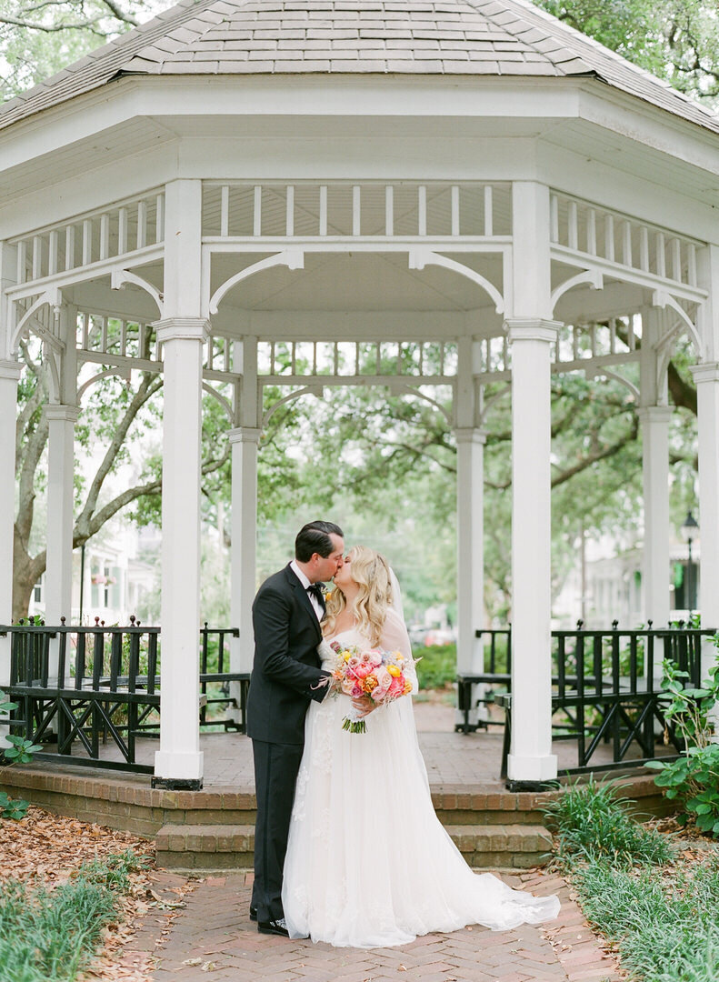 Bride and Groom in Front of Gazebo at Whitefield Square photo