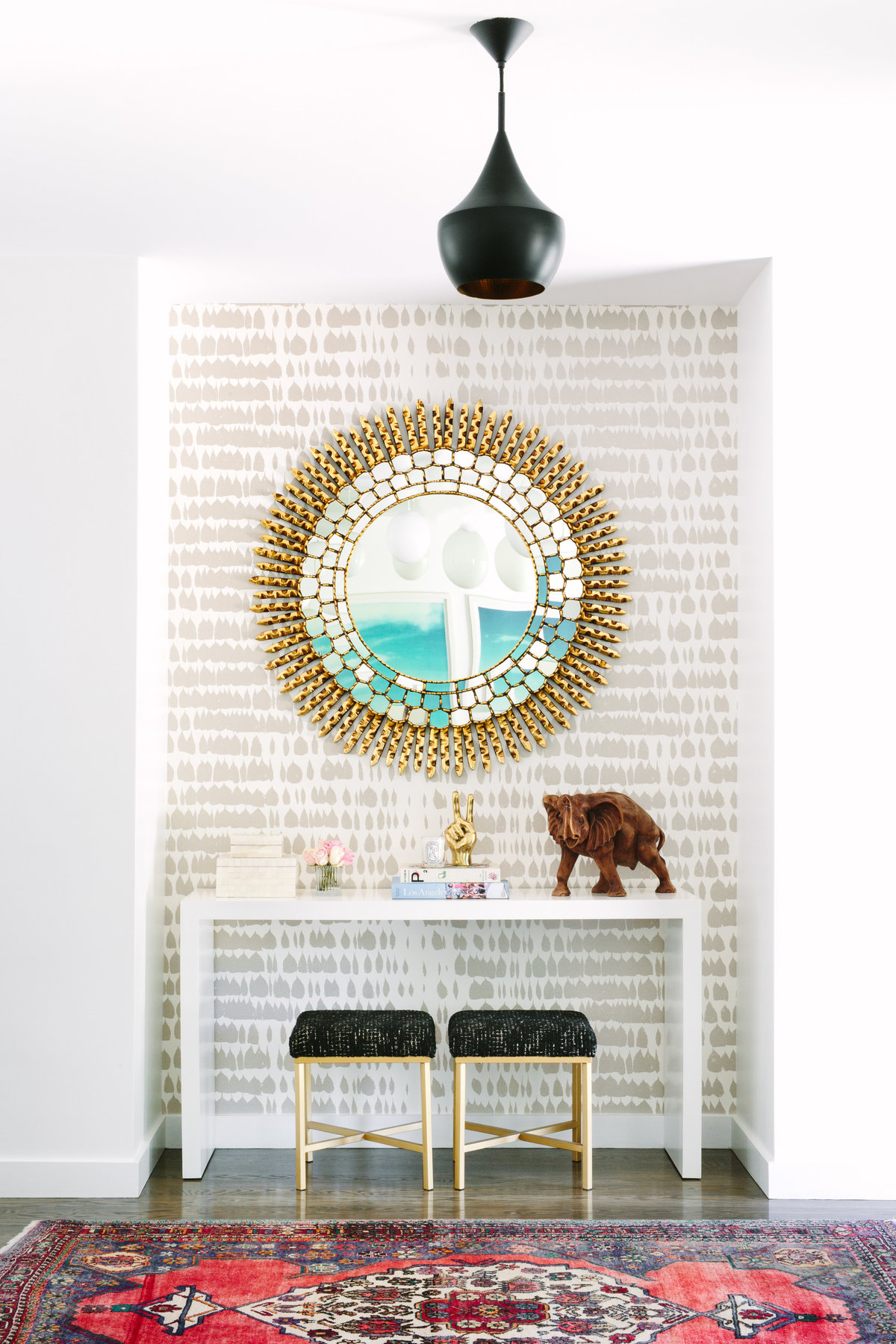 Entryway with Schumacher Queen of Spain wallpaper, Priley Lane Sutton console,Nior brass peace sign, and Beat Pendant