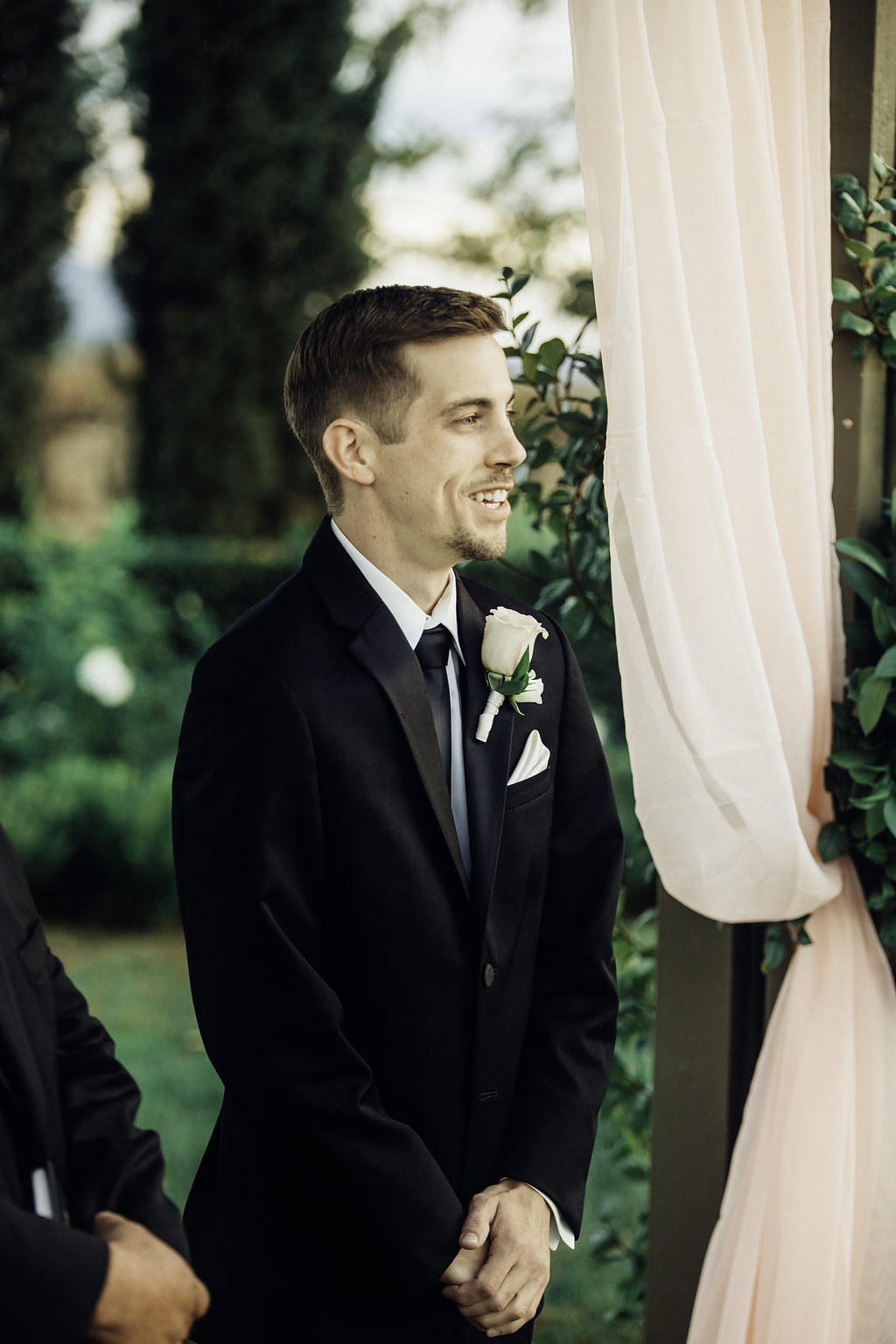 Wedding Photograph Of Man in Black Suit Smiling Los Angeles