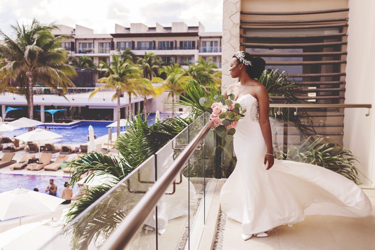 Portrait of bride on balcony at Cancun wedding