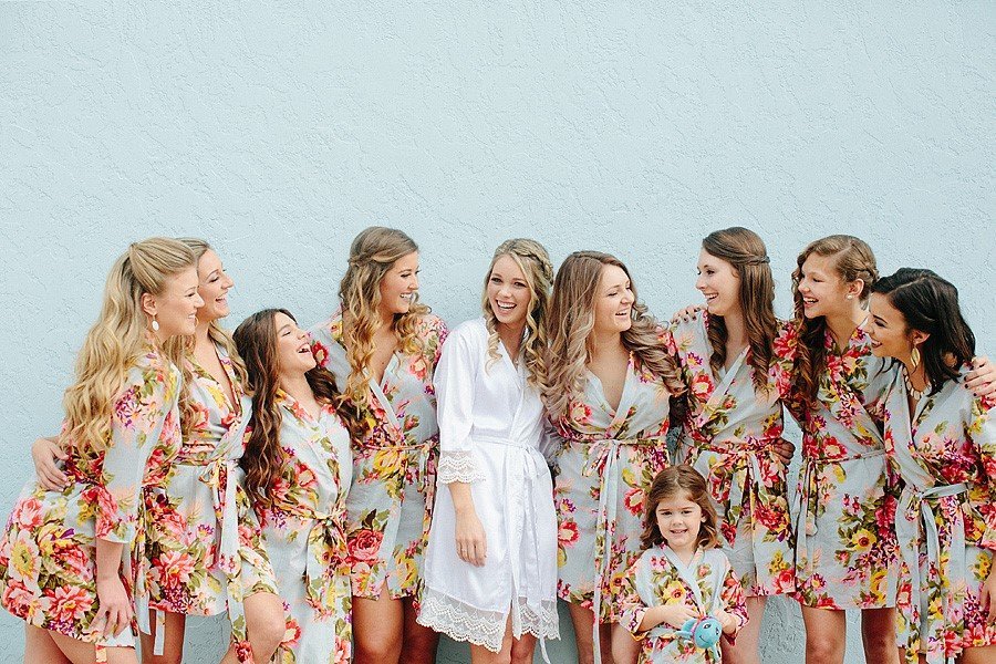 bridesmaids wearing floral robes