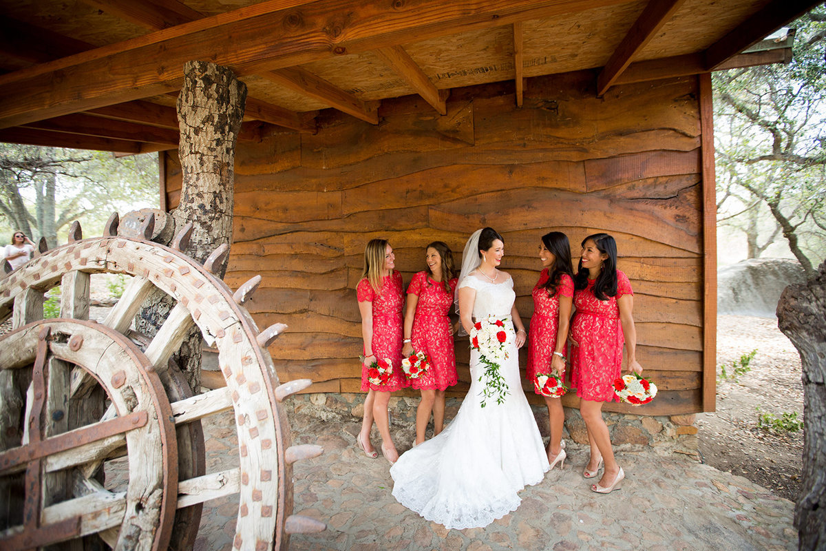 Destination wedding photos bridal party rustic barn