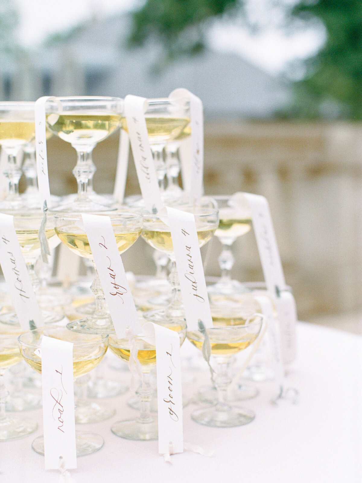 Champagne glass tower with name tags