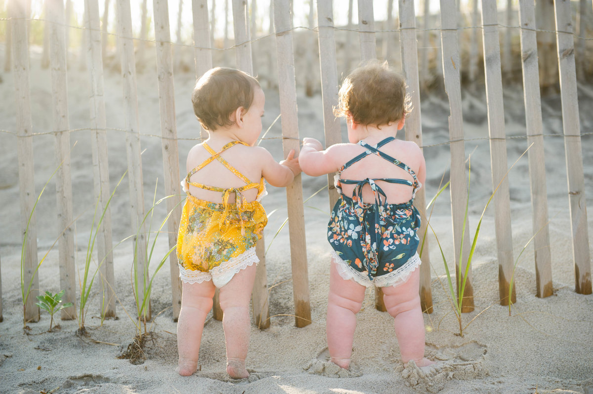 twin girls at dune fence