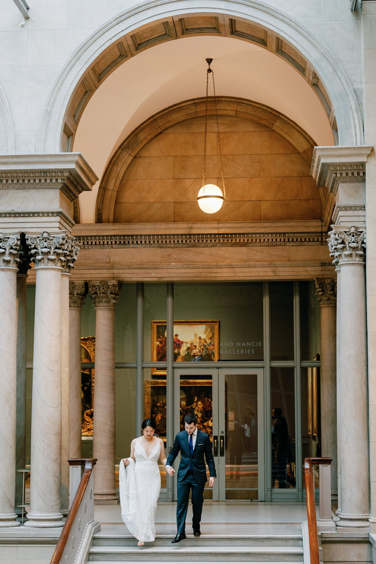 A quiet moment between newlyweds on their wedding day at the Art Institute of Chicago