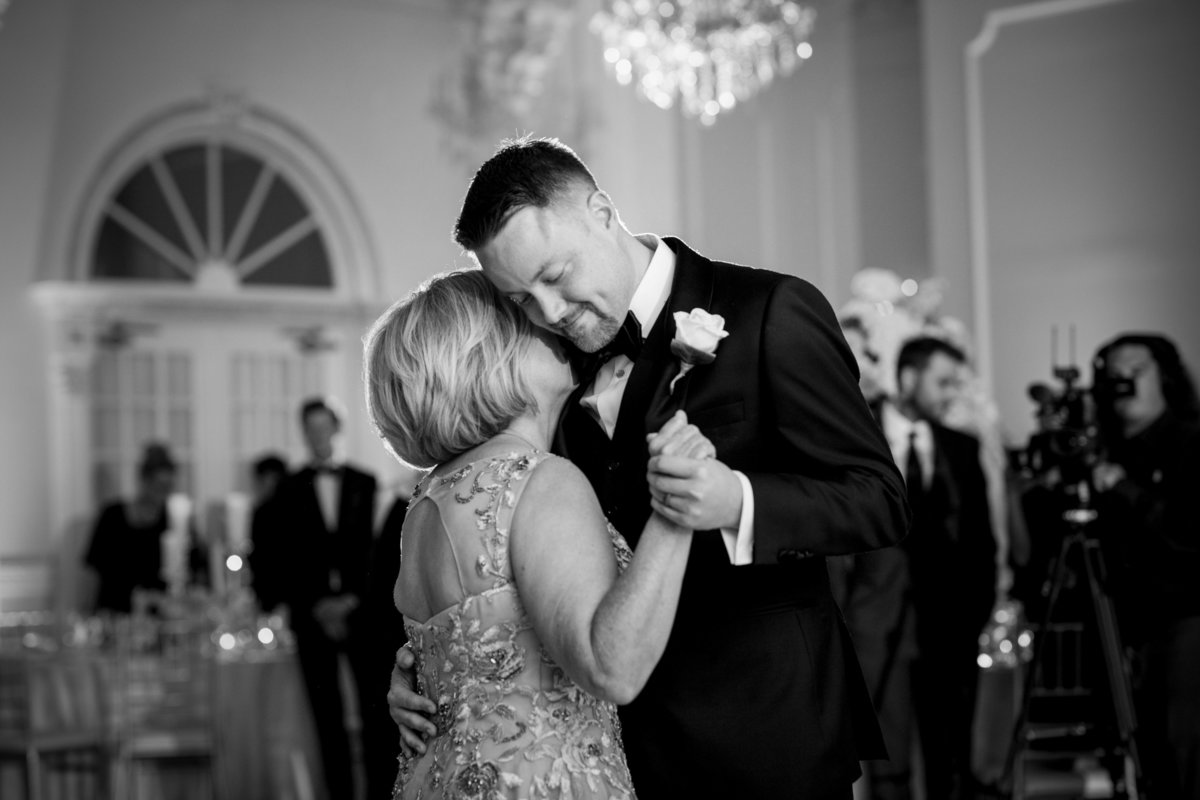 groom dancing with mom at addison park wedding
