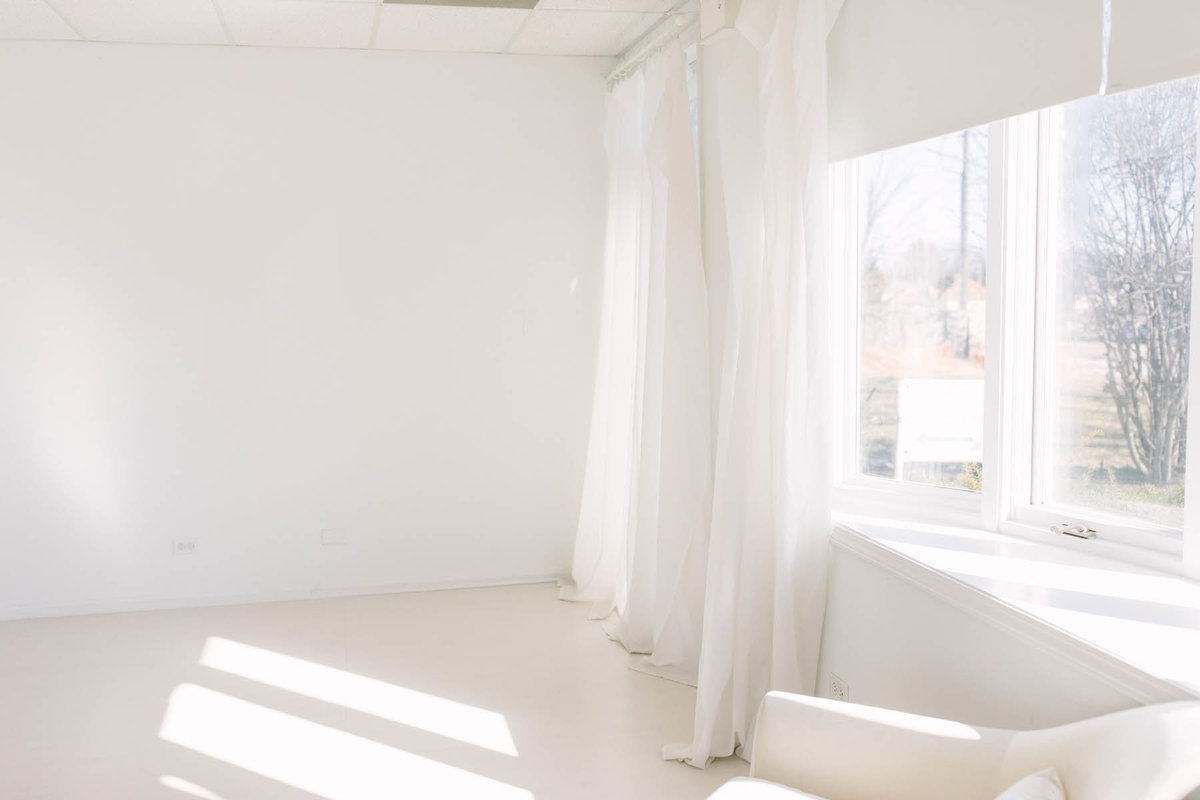 Laurie Baker with Elle Baker Photography offers a peek into her beautiful natural light studio setup