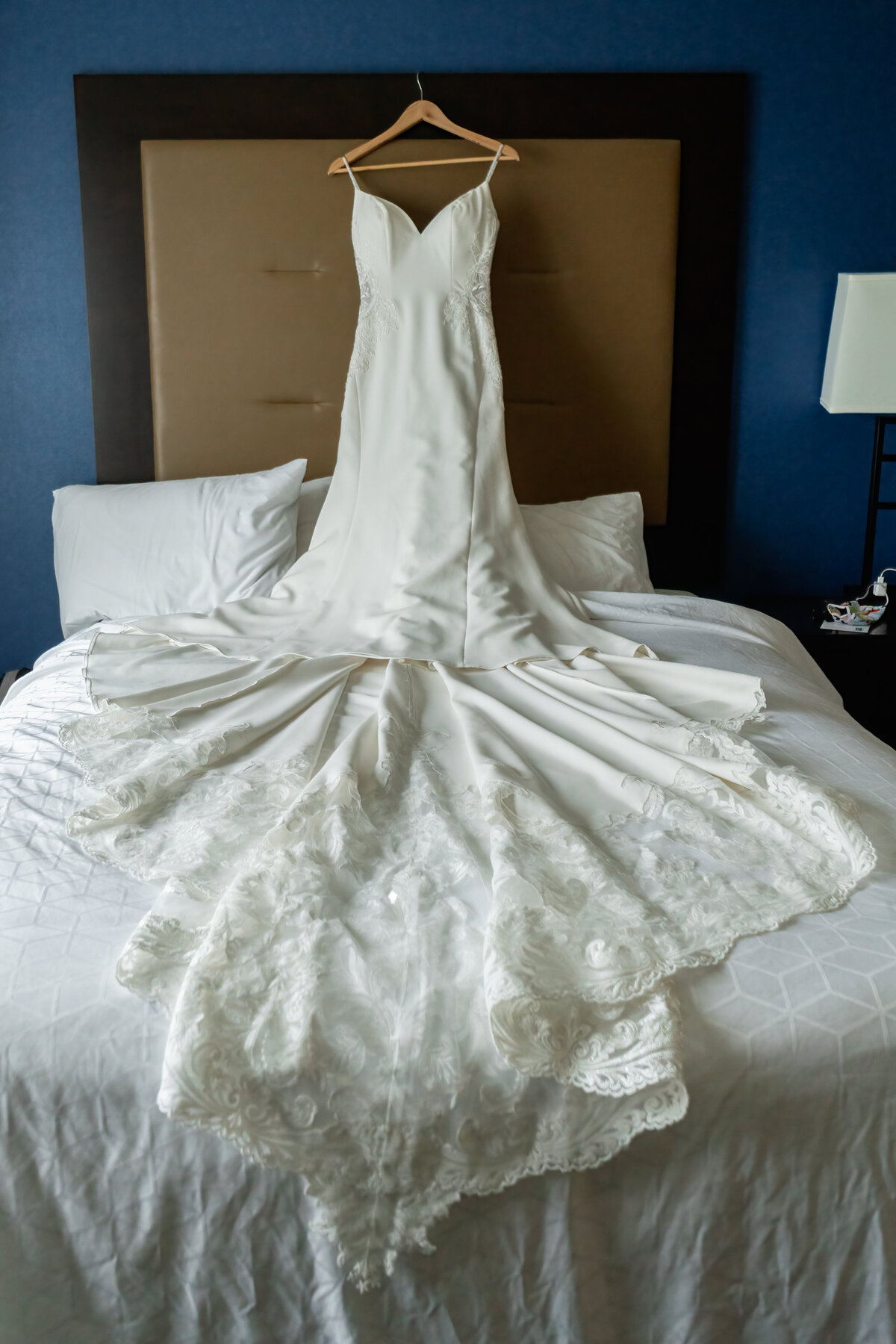 wedding dress on the bed