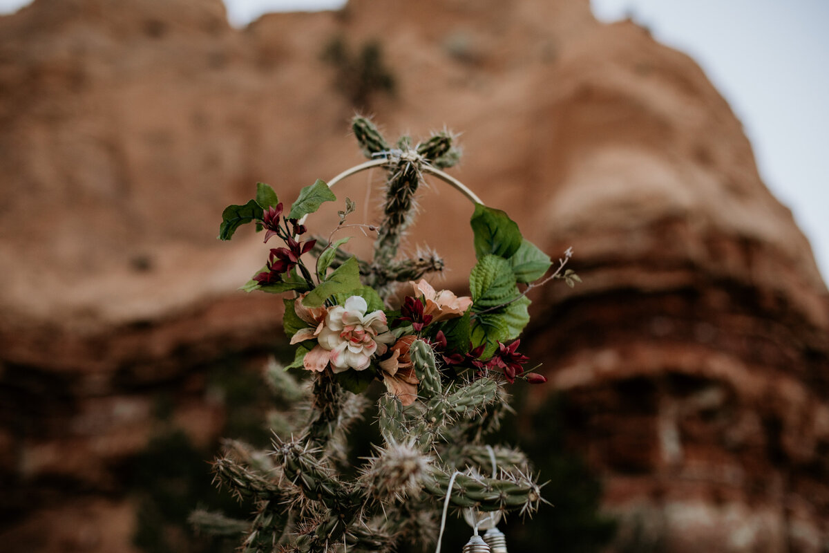 ring bouquet hanging in front of red rocks