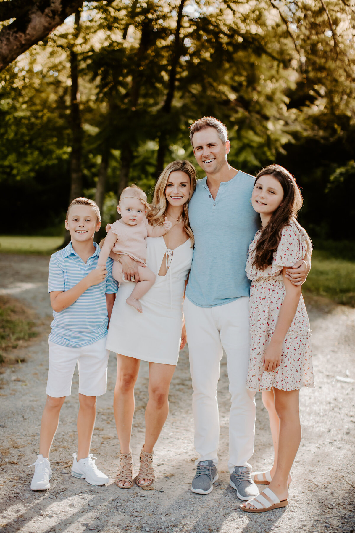 family portrait in white and blue clothes