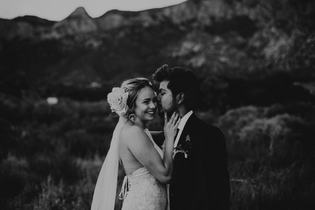 bride and groom laughing in Albuquerque