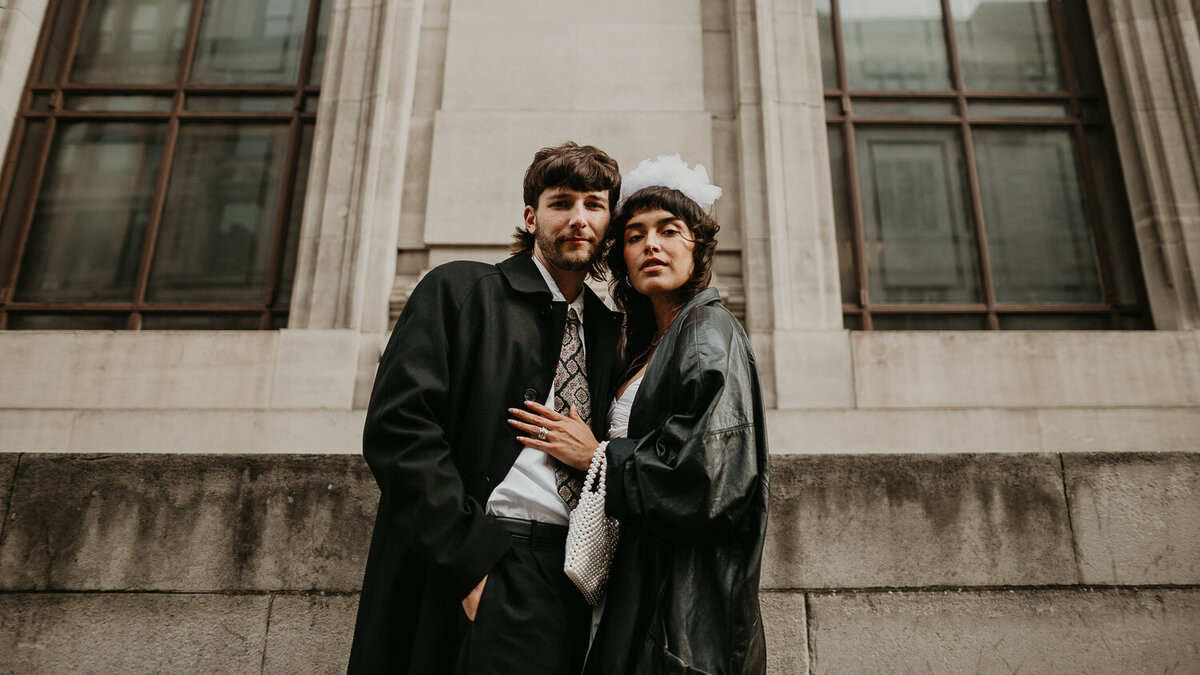A bride and groom on their wedding day in London.
