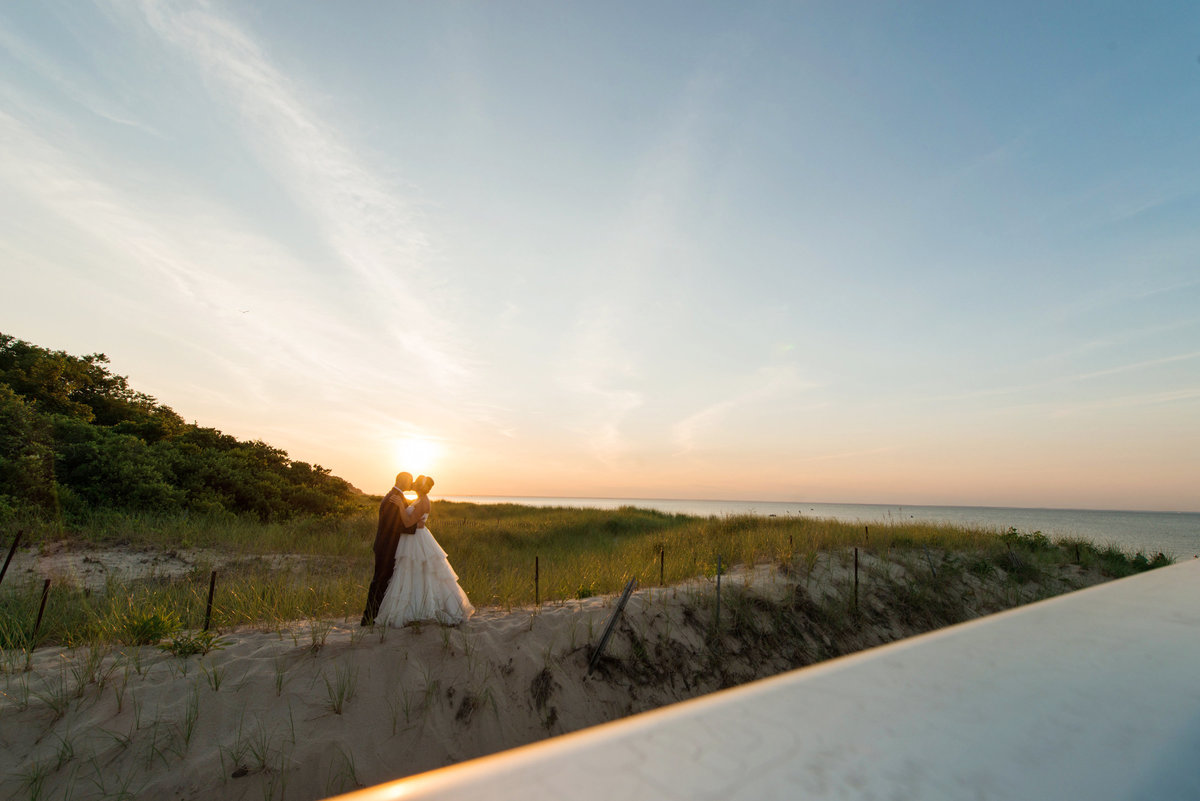 distant photo bride and groom from wedding at Pavilion at Sunken Meadow