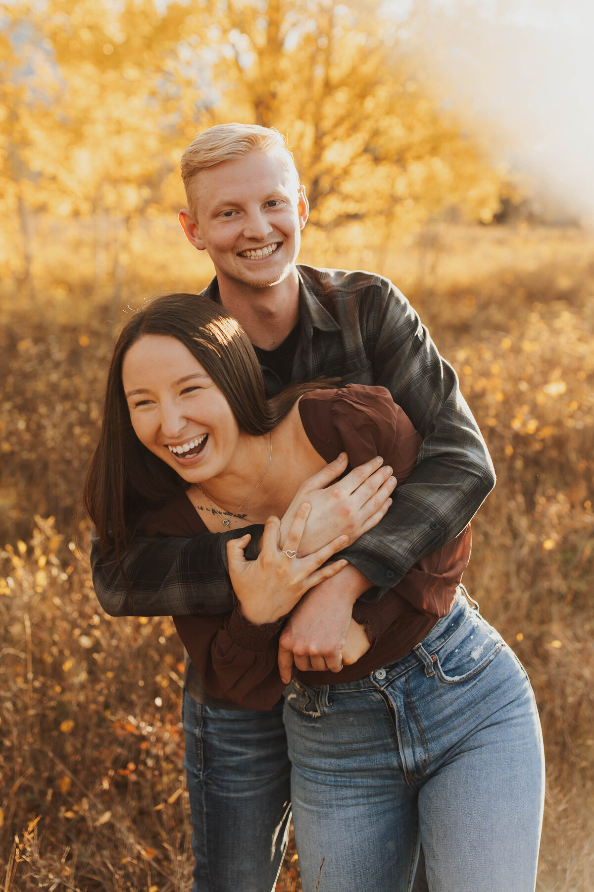 couple embracing laughing