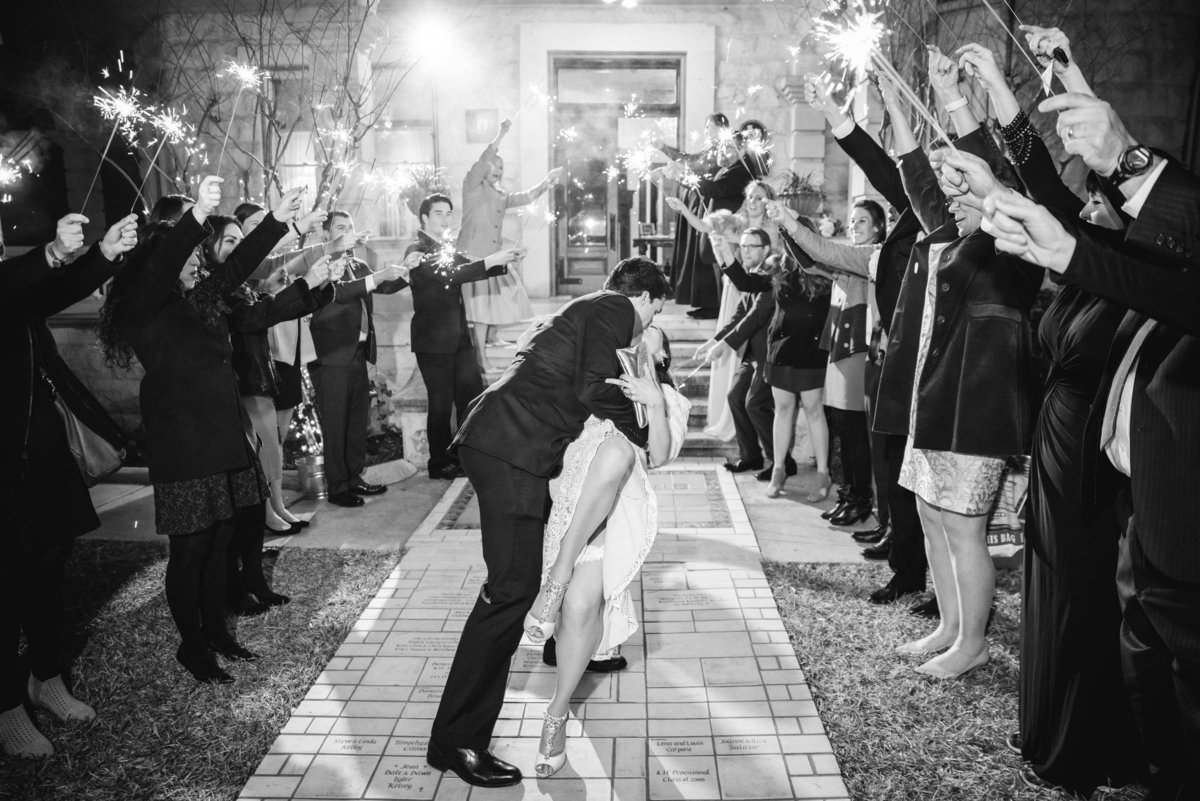 Chateau bellevue wedding photographer bride groom exit dip kiss 708 San Antonio St, Austin, TX 78701