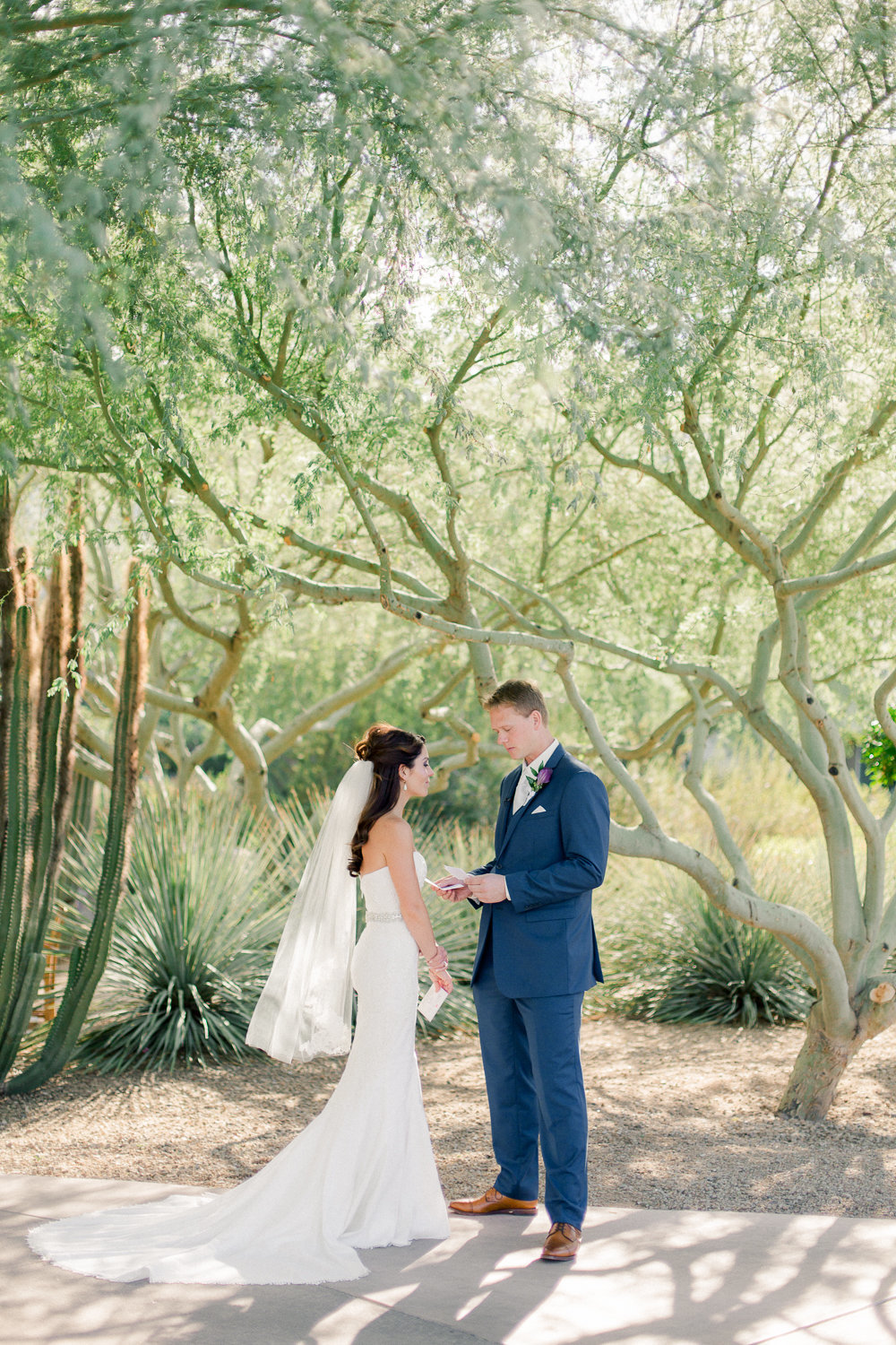arizona destination wedding desert ridge marriot bride and groom reading vows