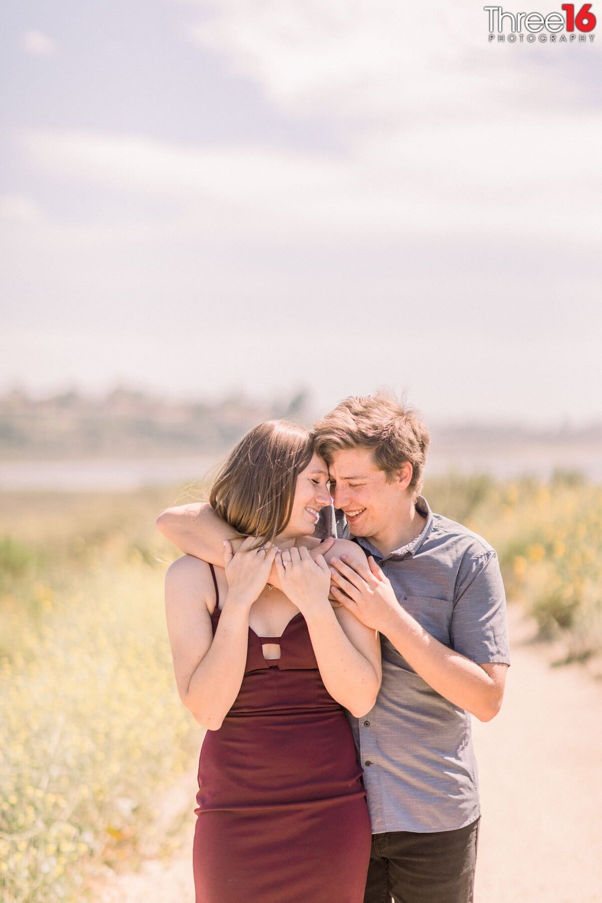 Engaged couple get cozy during engagement session