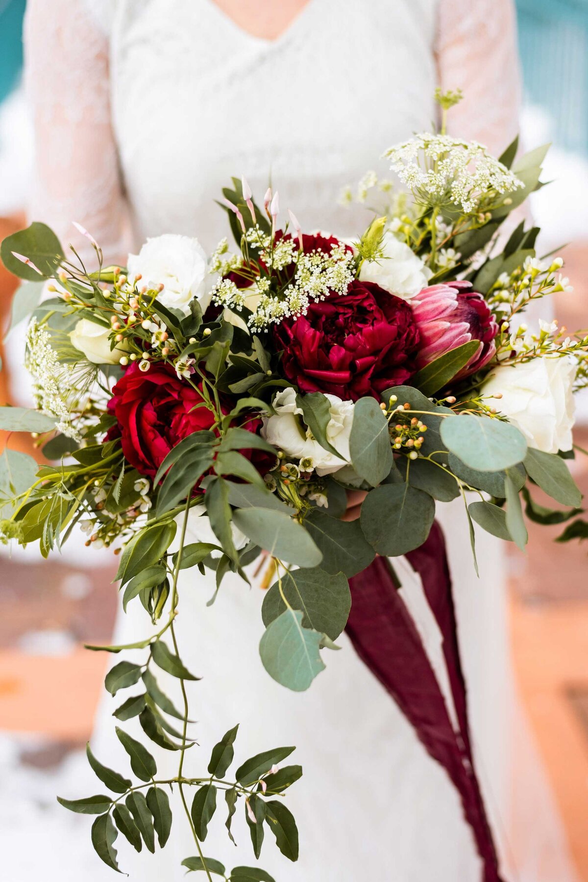 white and burgundy bridal bouquet