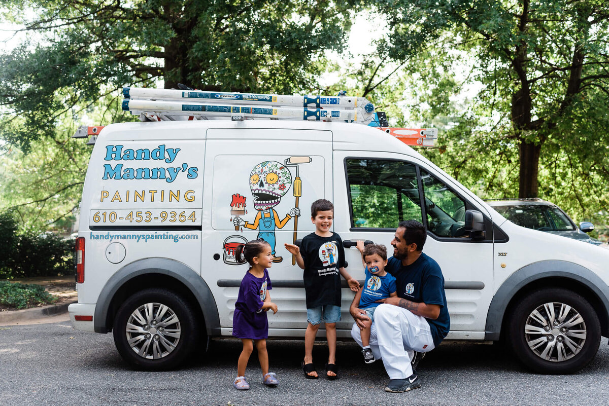 Owner of Handy Manny's Painting with his children during branding session in Northern VA