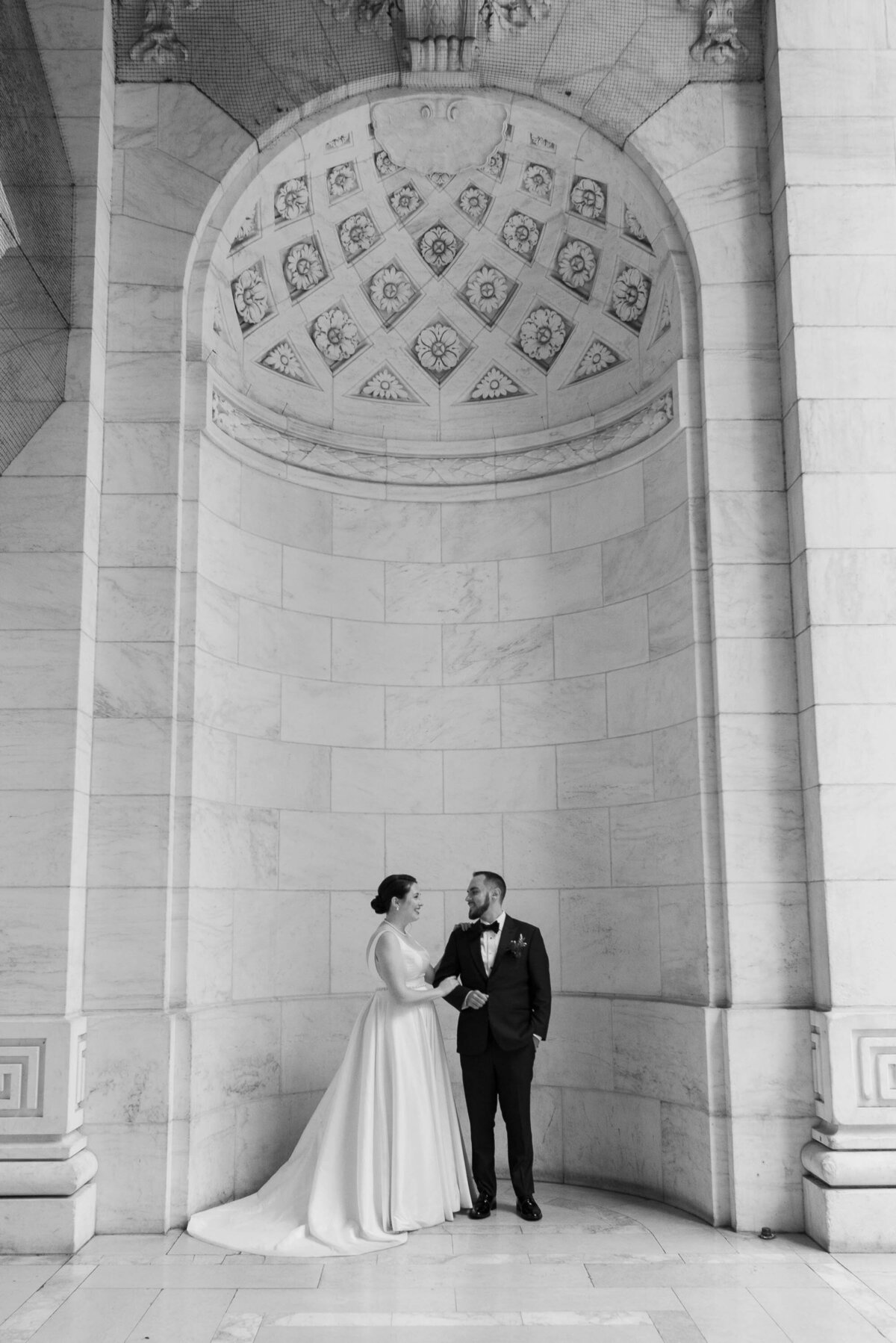 bride and groom in nyc public library