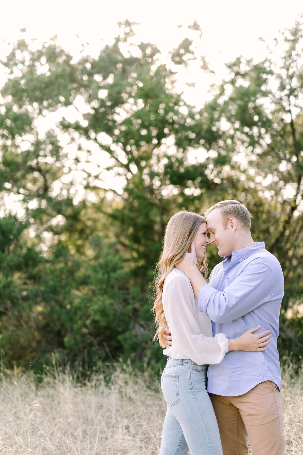 Sunset engagement session in the fields at Brushy Creek Park