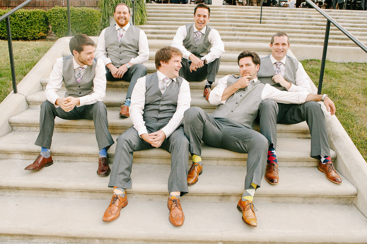 A casual wedding party photograph of a groom and his goomsmen at Villa Montalvo.