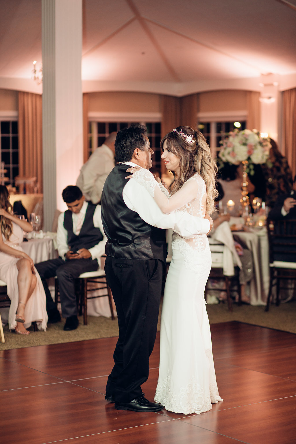 Wedding Photograph Of Man In Black Suit And Bride Dancing Side View Los Angeles