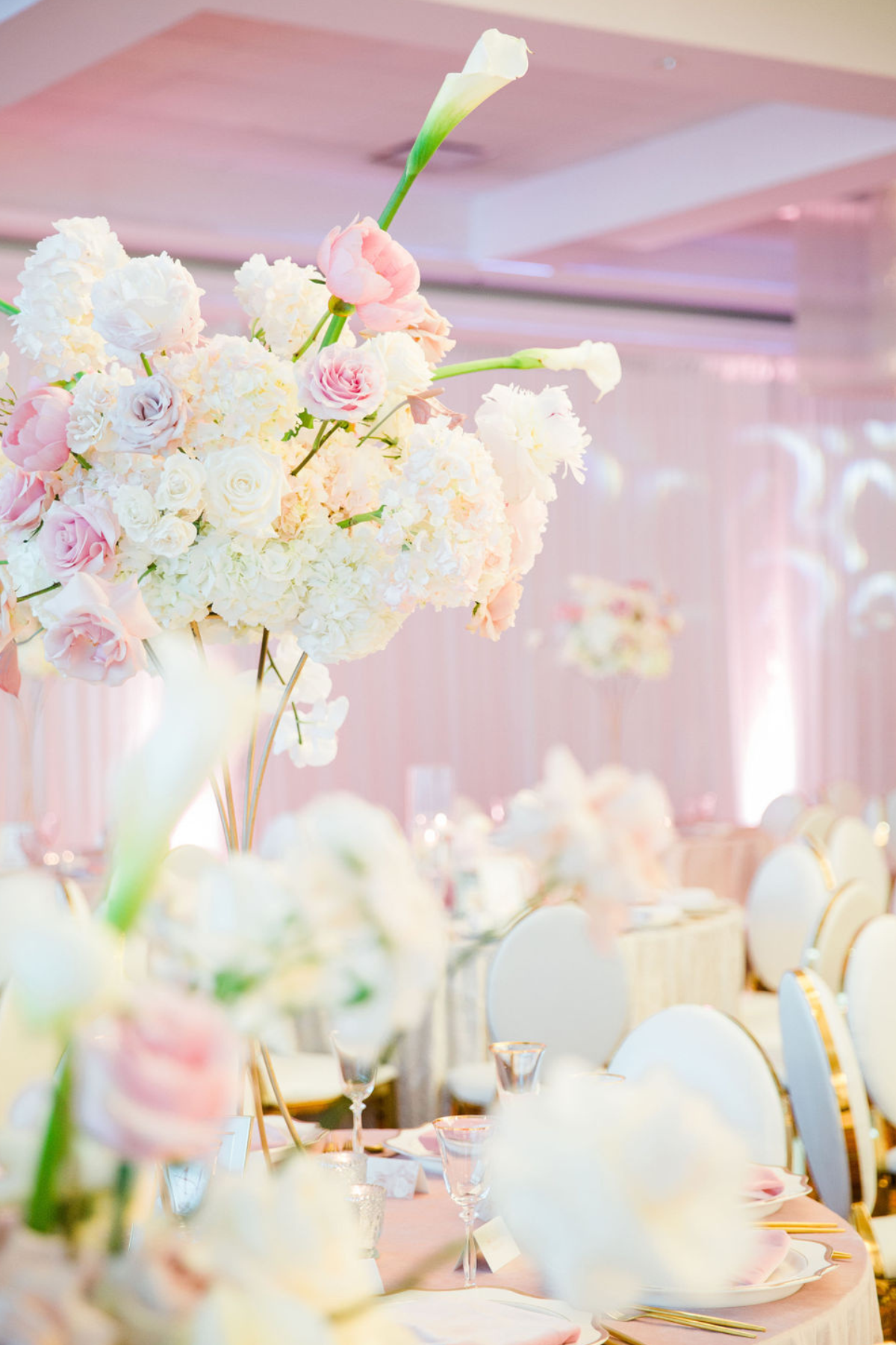 pink-peach-gold-ivory-engagement-party-tall-floral-arrangement-roses-hydrangea