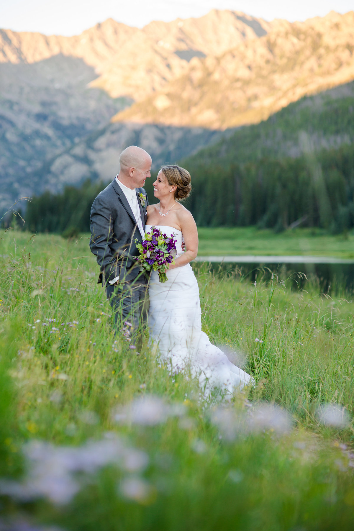 wedding couple in Colorado wildflowers