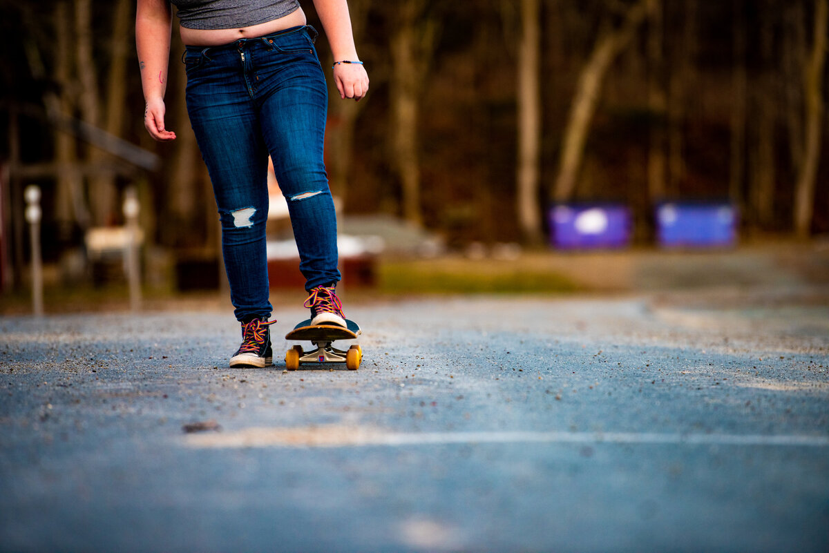 Child skateboards down the street