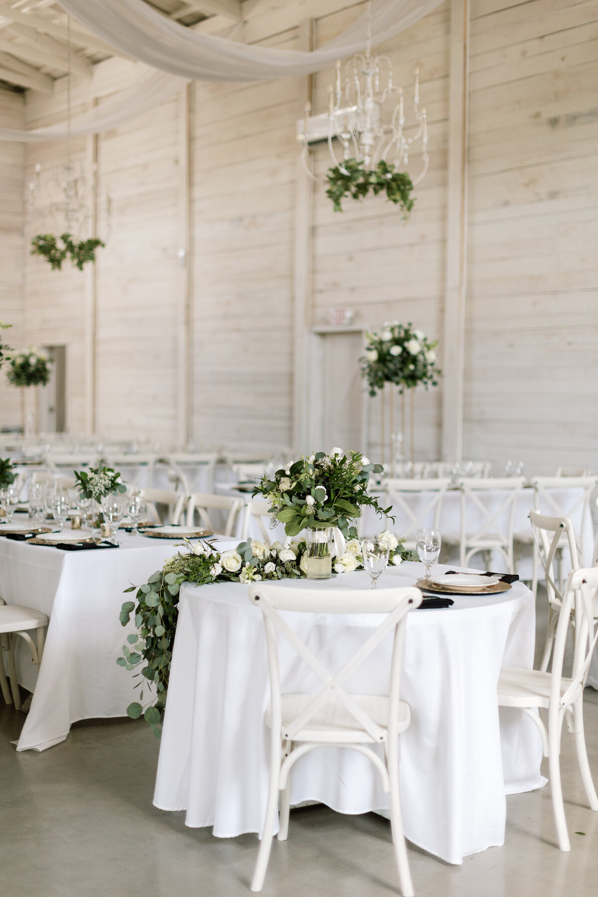 Garden party style indoor reception at White Dove Barn
