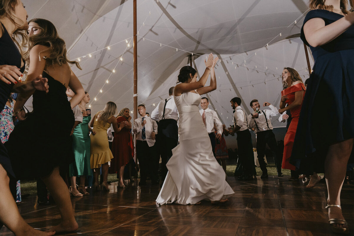 Bride dancing with her guests