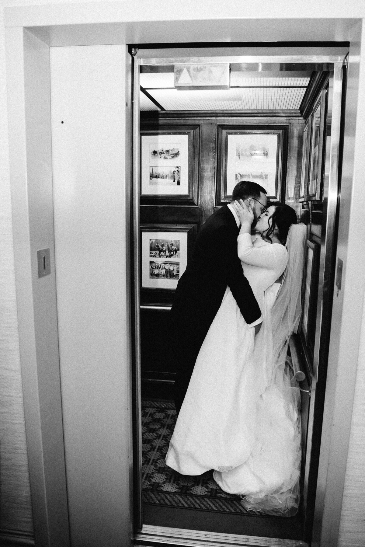 bride and groom in the elevator at wedding at willcox